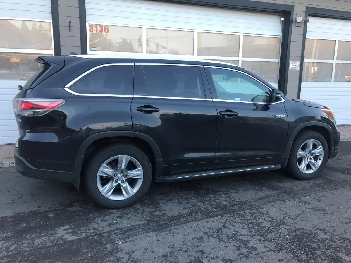 Black SUV before exterior detailing